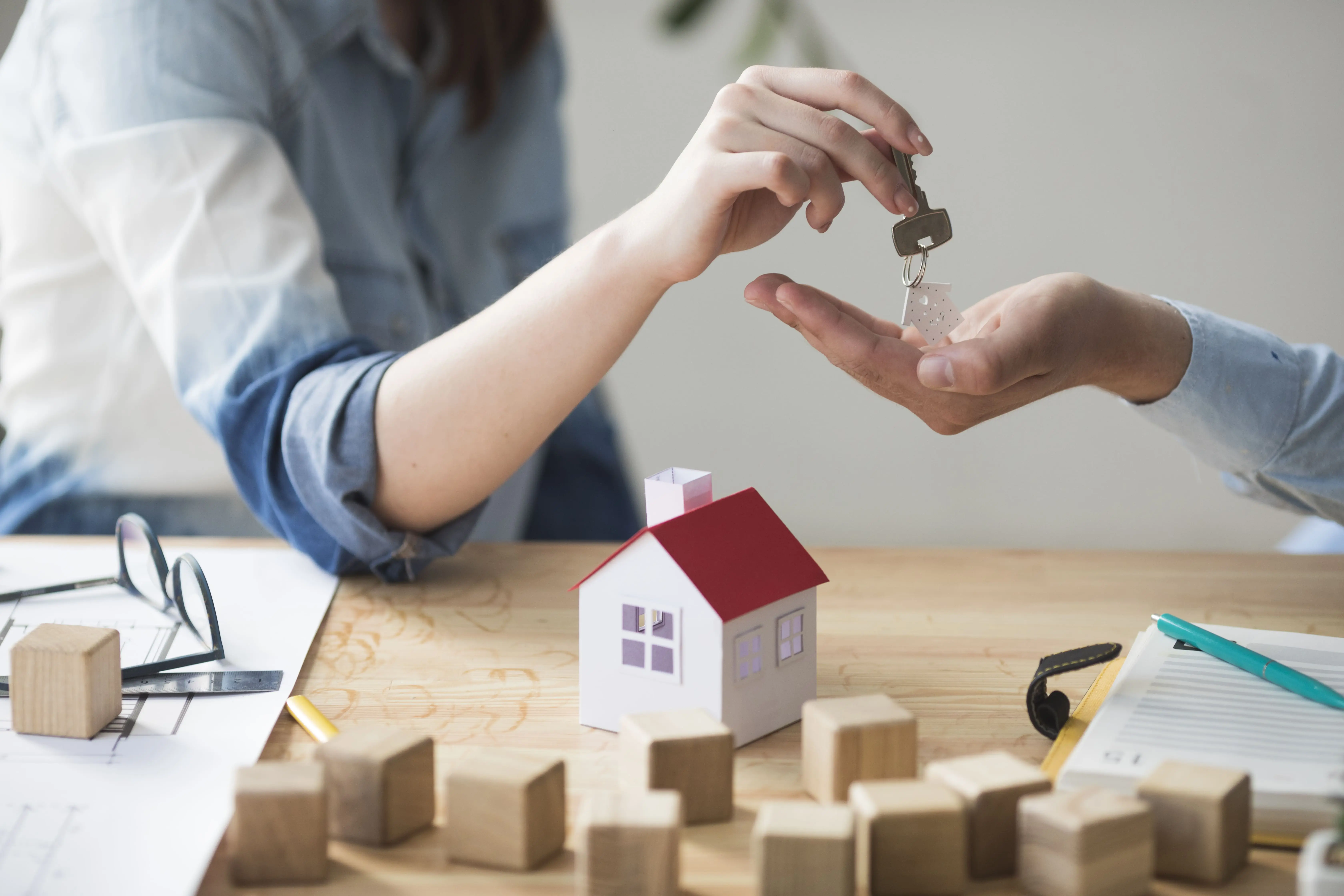 Landlord giving keys to a tenant