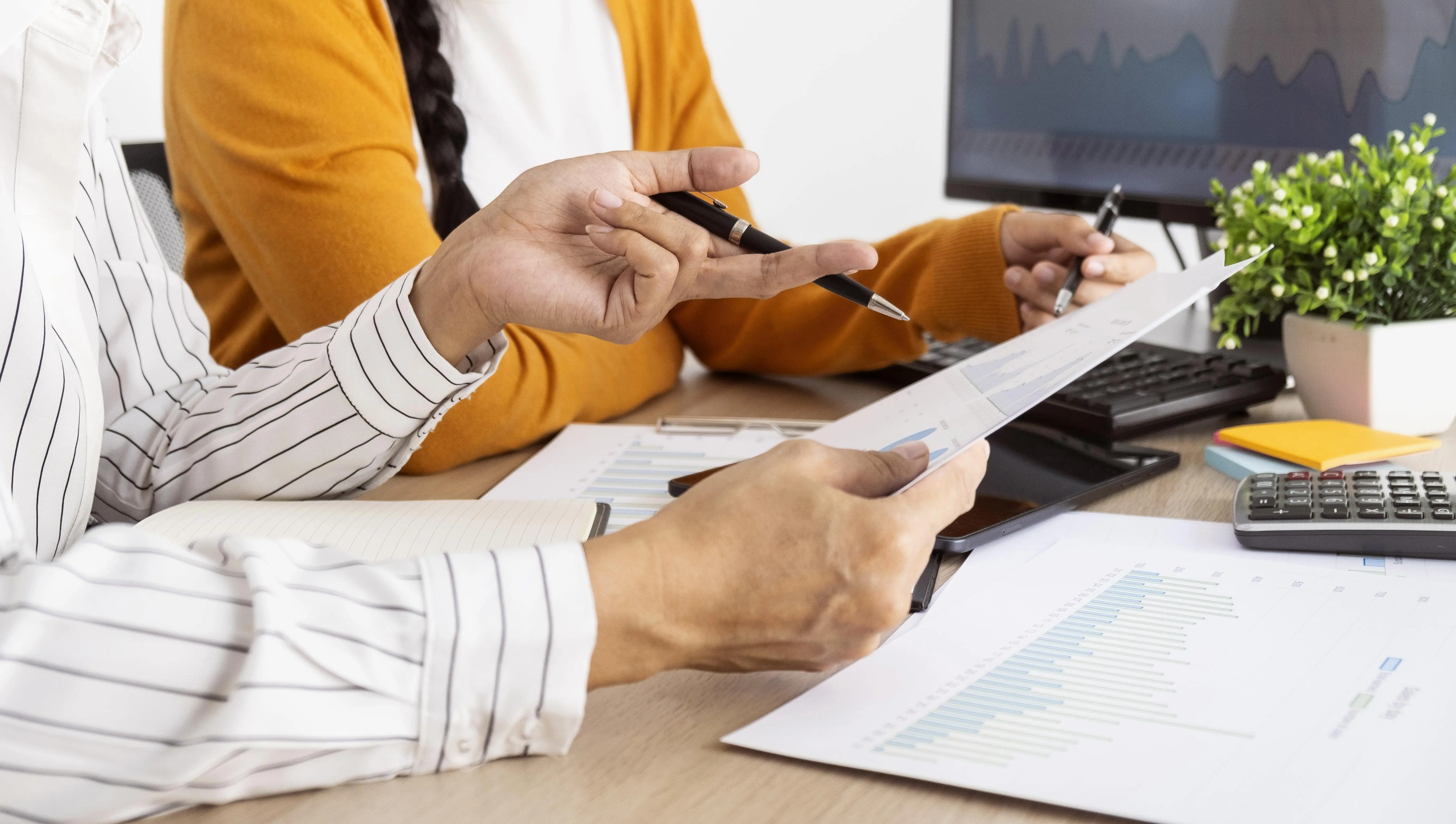 Team reviewing contract documents in a professional office